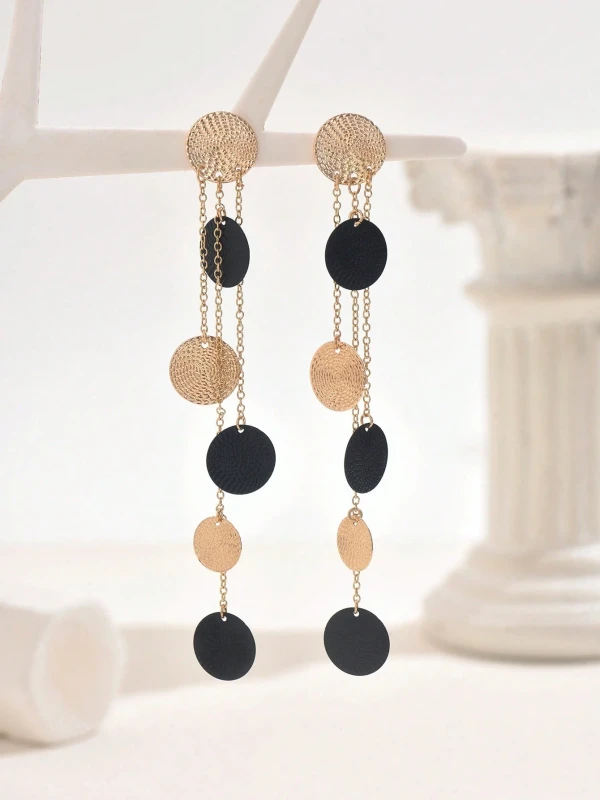 Kolczyki Black &amp; Gold Eclipse – długie złote kolczyki z czarnymi i złotymi krążkami, elegancka biżuteria o geometrycznym designie.