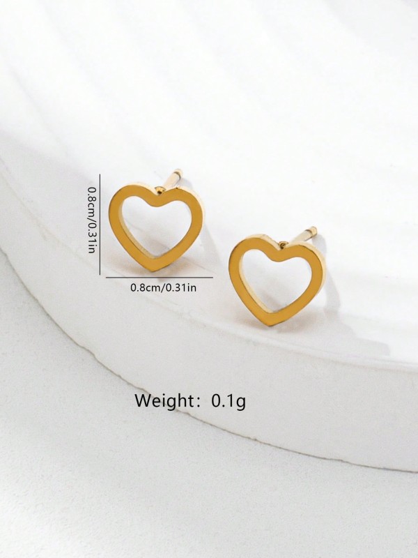 Kolczyki Petite Heart – małe złote kolczyki w kształcie serca, minimalistyczna biżuteria dla kobiet.