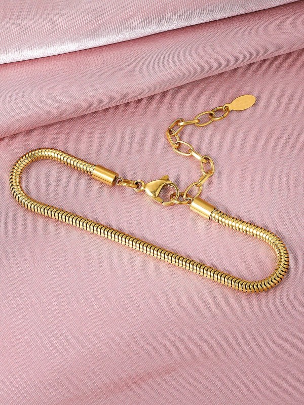 Złota bransoletka typu snake chain z gładkim, elastycznym splotem i regulowanym zapięciem (6).webp