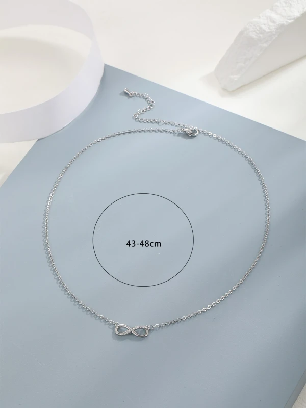 Srebrny naszyjnik z symbolem nieskończoności na cienkim łańcuszku (4).webp