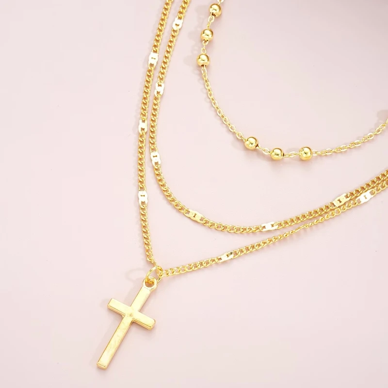 Naszyjnik Trinity Faith złoty potrójny warstwowy z krzyżykiem (1).webp